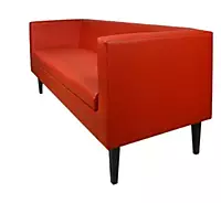 red sofa hire Berlin – bold red faux leather sofa in event lounge setting