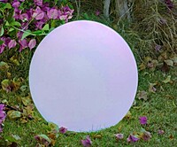 LED sphere seat hire Berlin – large glowing 60 cm orb seat in lounge setup