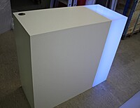 LED lockable counter hire Berlin – LED-lit reception unit with lockable storage